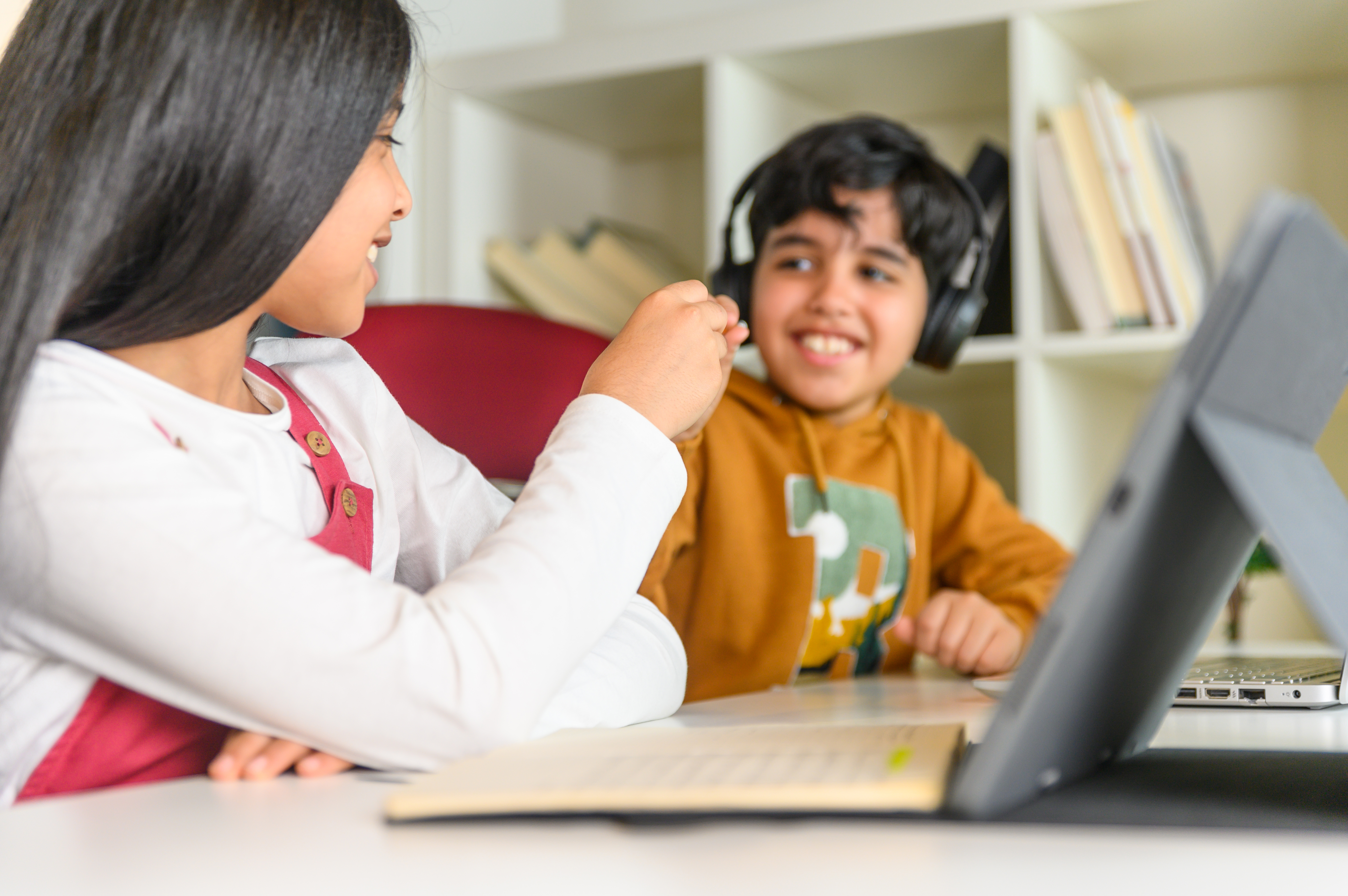 Young students attending an online class
